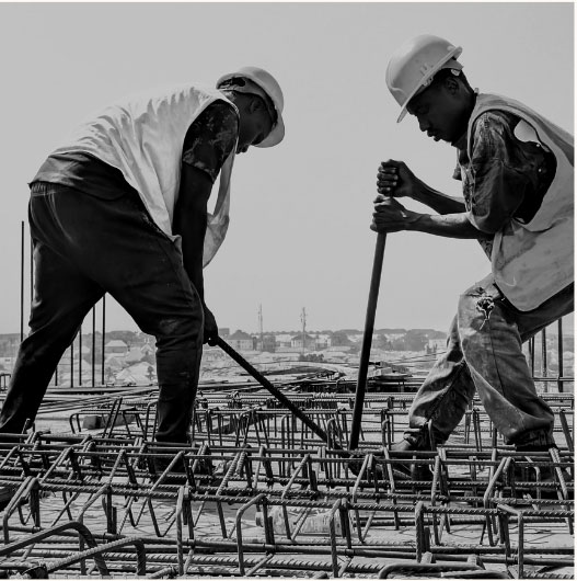 Construction workers managing structural site activity